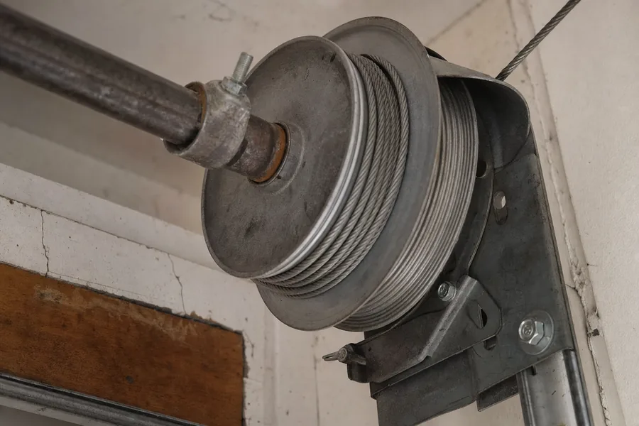 Lift cable wound onto its drum above a garage door in York, PA