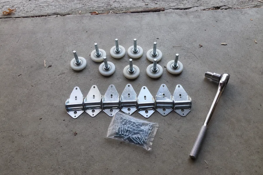 New rollers and hinges ready for a garage door in York, PA